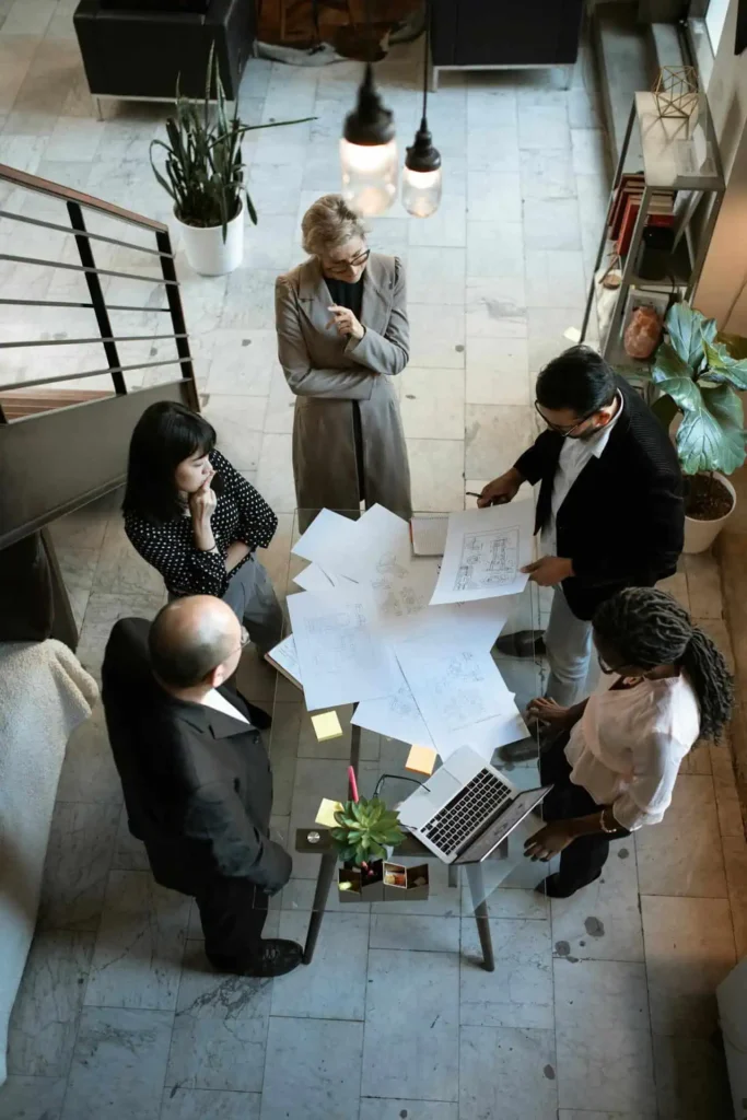 team looking over paperwork together